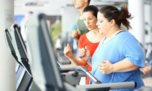 woman running on treadmill