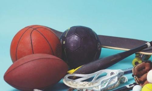 Sports equipment - basketball, football, soccer ball, lacrosse stick, baseball glove and bat