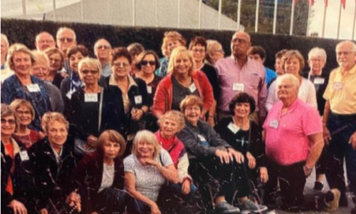 Group photo of active older adults on a field trip