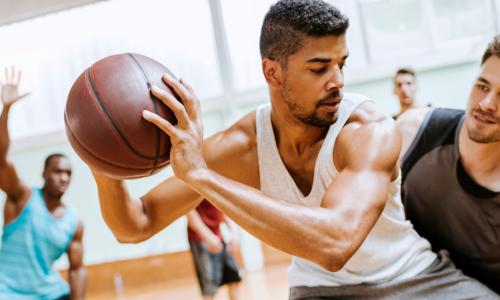 Group of friends playing basketball
