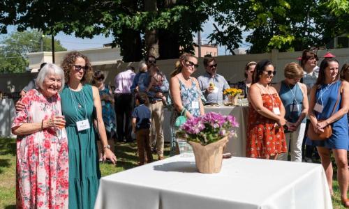 Members gathering for opening of Susan's Garden