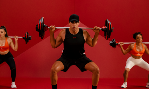 3 people using free weights and squatting. red background