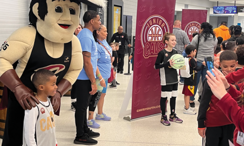 Sir CC poses with a Jr. Cavs participant