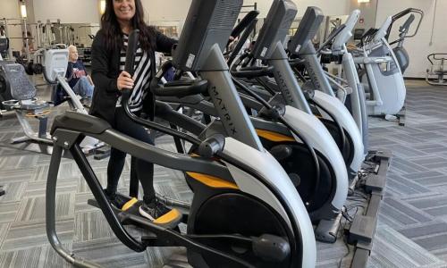 woman smiling on treadmill