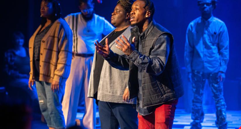 people on stage performing