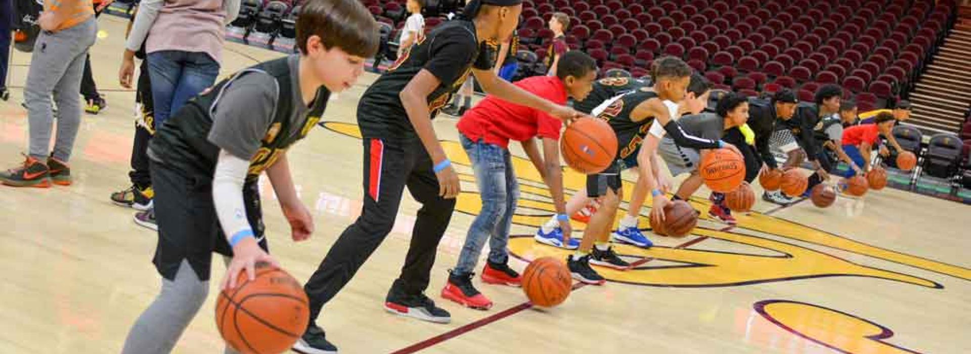 Jr Cavs practicing basketball at healthy kids day
